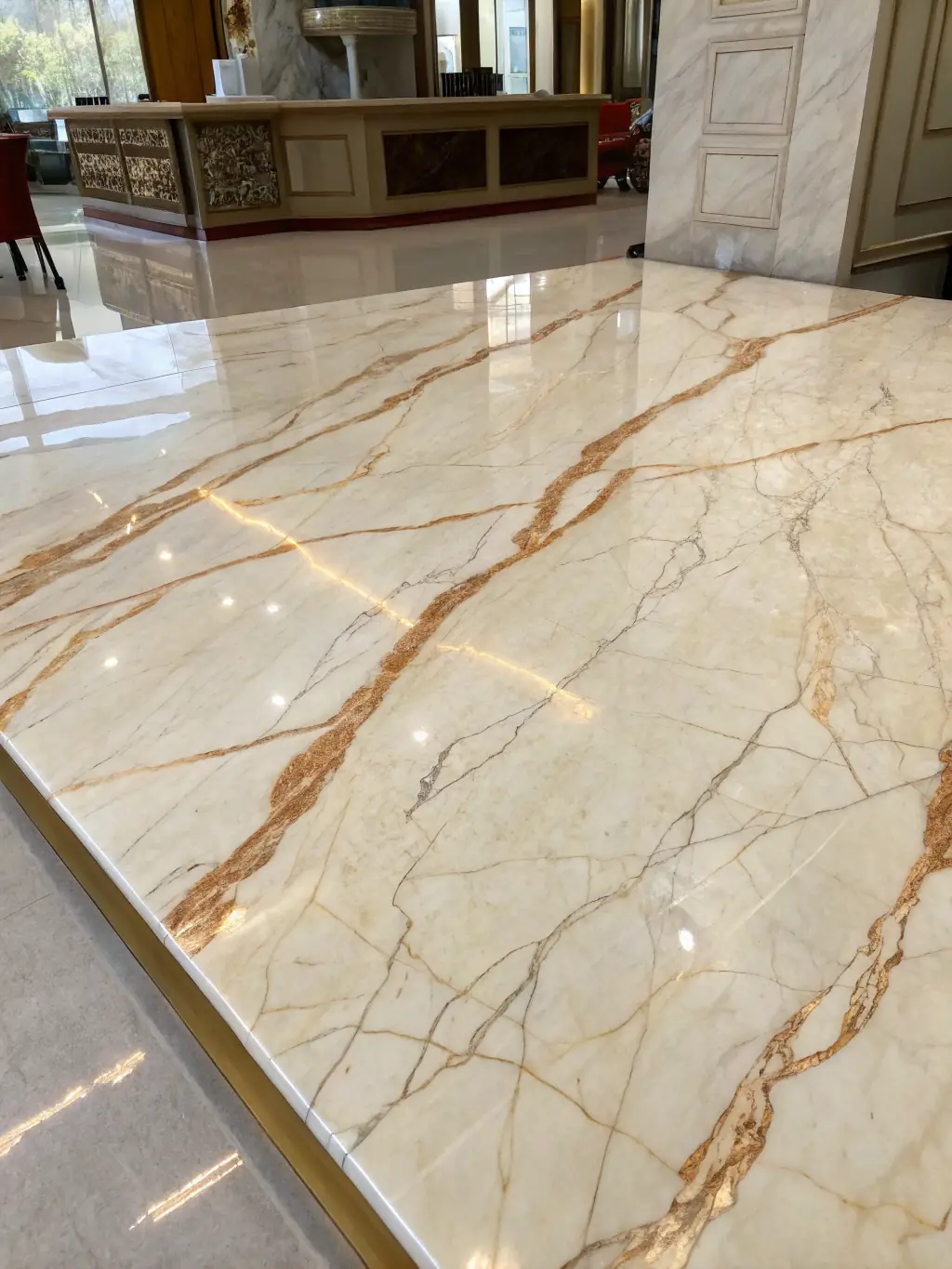 A close-up of a marble floor being polished in a luxurious living room, highlighting the natural beauty and elegance of the marble.